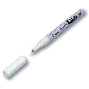 White permanent marker with...